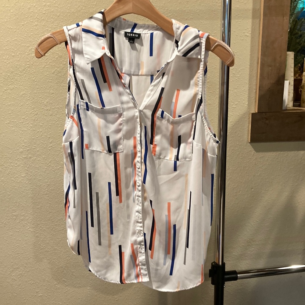 Torrid sleeveless, collared, button-down tank.